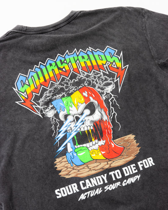 The SourStrips Sour Storm Tee is a unisex cotton shirt with a vibrant melting skull, lightning, clouds, bold “Sourstrips” text above, and “Sour Candy To Die For Actual Sour Candy” below—perfect for any Sour Strips fan.