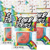 Three packets of "Rainbow-Six Pack" candy from the brand SourStrips are shown. The resealable bag is colorful with splashes of green, red, yellow, and blue. Each packet displays twisted, multi-colored extremely sour candy strips through a clear window on the front.