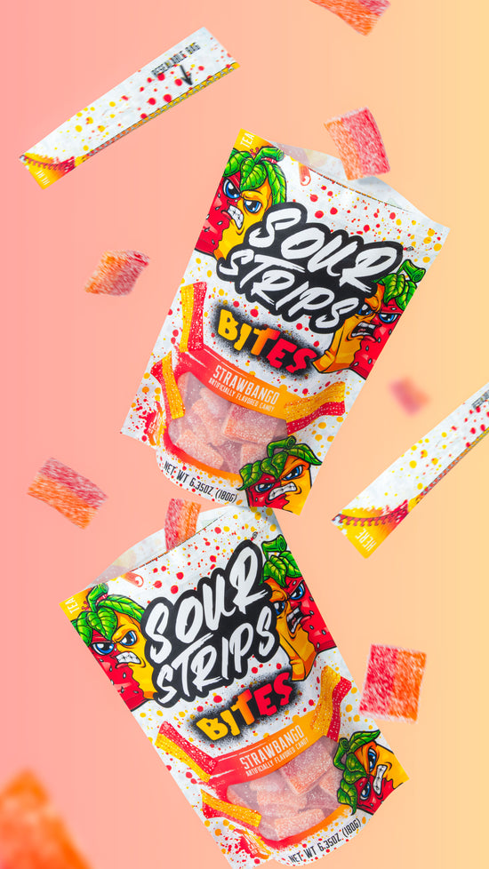 Sour Strips Bites-Four Pack candy in colorful packaging pops against a peach gradient backdrop. Strawberry strips, both loose and spilling from open packets, showcase vibrant red and yellow hues that embody the extreme sour flavor of every Sour Strips bite.