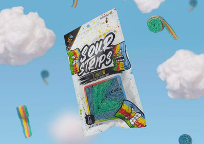 A bag of Sour Strips Rainbow candy is suspended against a blue sky backdrop with fluffy white clouds. The candy, brightly colored with shades of blue, green, red, yellow, and orange, is also seen unwrapped and floating around the bag.
